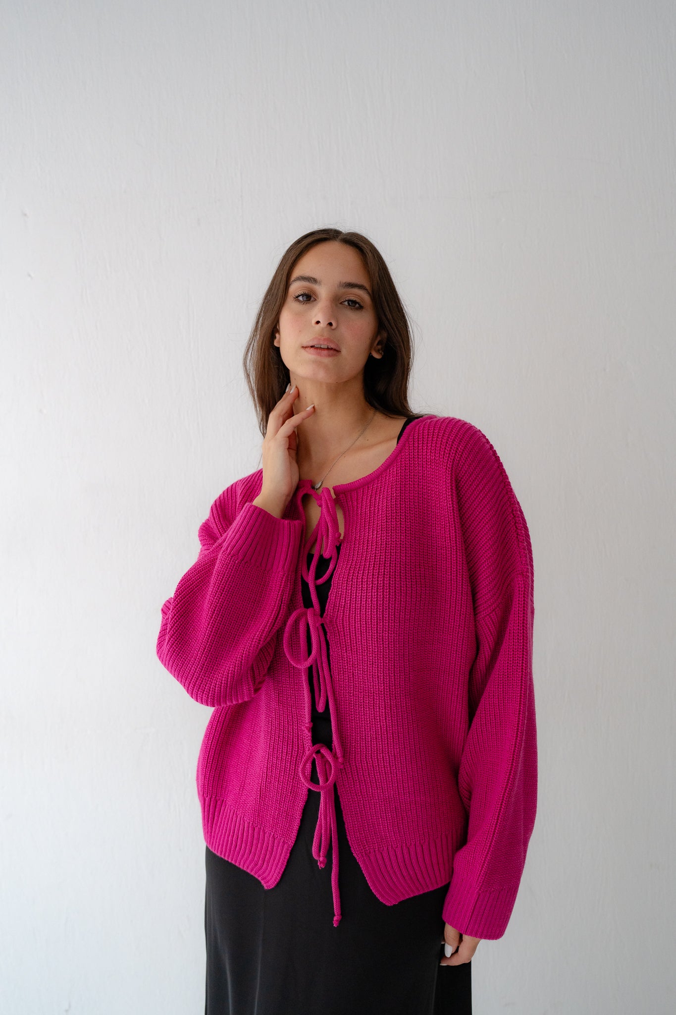 KNIT CARDIGAN WITH BOW IN FUCHSIA